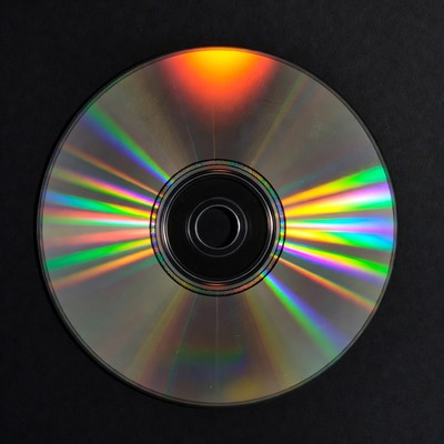 Shiny CD Disc on Black Background