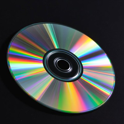 Shiny CD Disc on Black Background