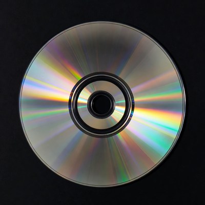 Shiny CD Disc on Black Background