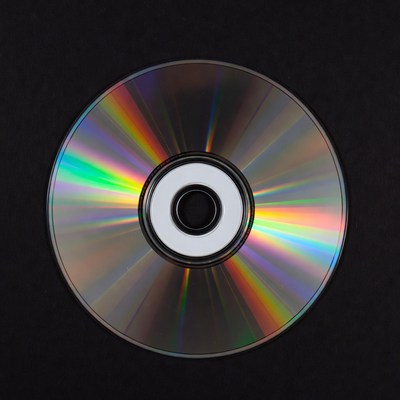 Shiny CD Disc on Black Background