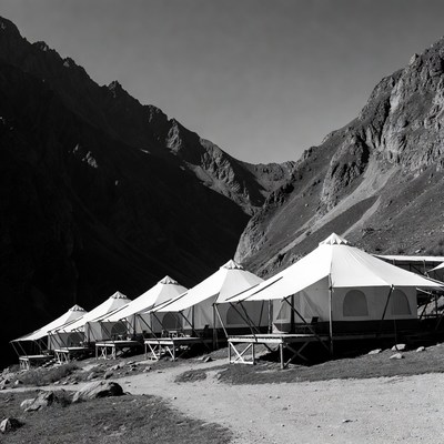 White tents in mountain valley