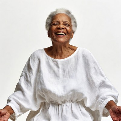 Elderly African-American woman laughing joyfully