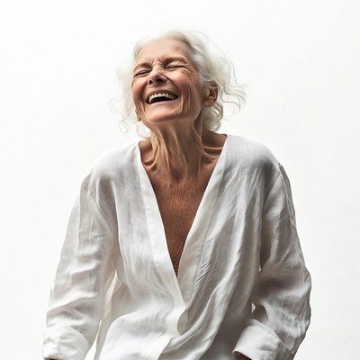 Elderly woman laughing joyfully