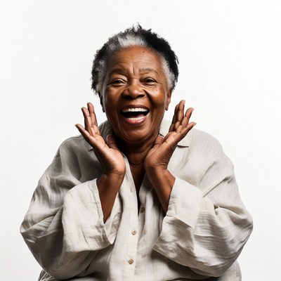 Elderly African-American woman laughing joyfully