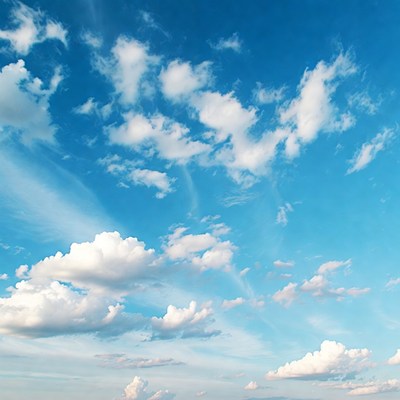 Blue sky with fluffy white clouds