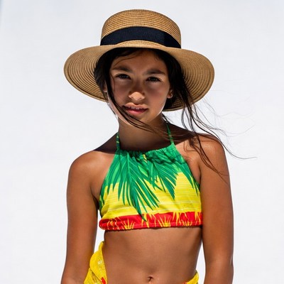 Asian girl in straw hat and tropical top