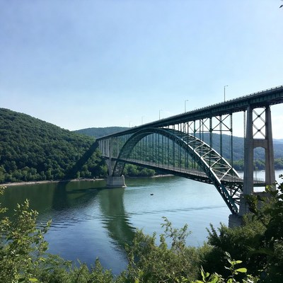 Steel arch bridge over river