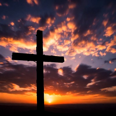 Silhouette Cross at Sunset