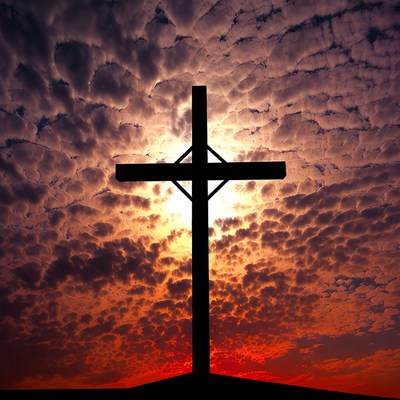 Silhouette Cross on Sunset Clouds