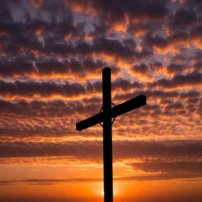 Silhouette Cross at Sunset
