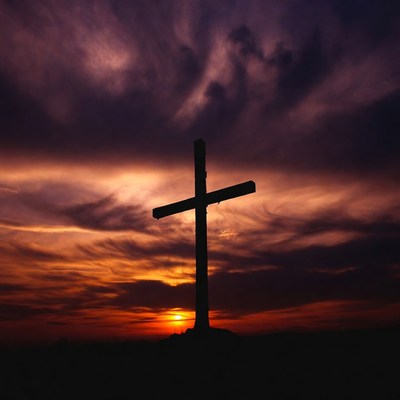 Wooden Cross Silhouette at Sunset