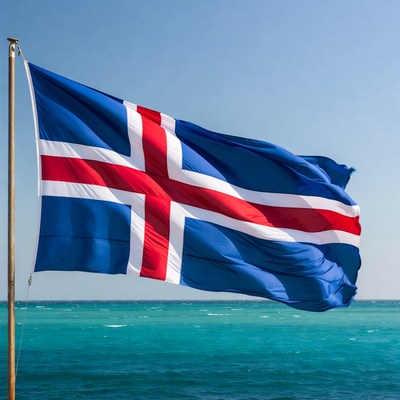 Icelandic Flag Waving Over Ocean