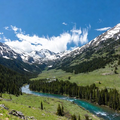 Mountain Valley with River and Snow Peaks
