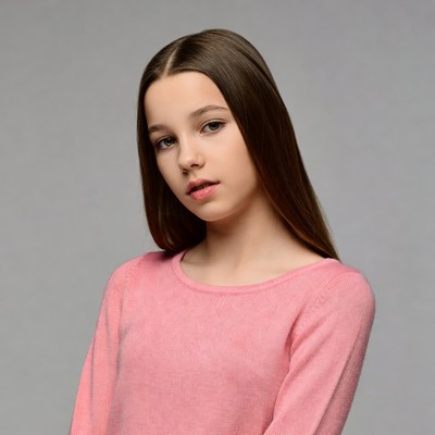 Teen girl in pink sweater