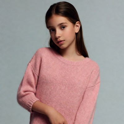 Girl in pink sweater