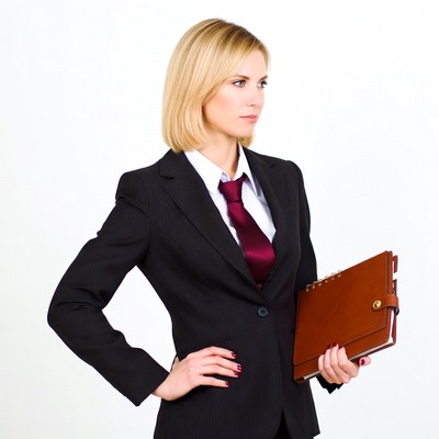 Blonde businesswoman holding leather notebook