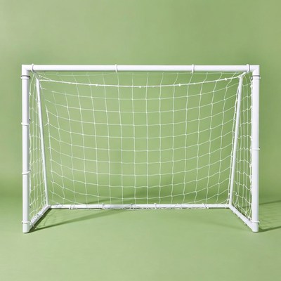 White soccer goal on green background