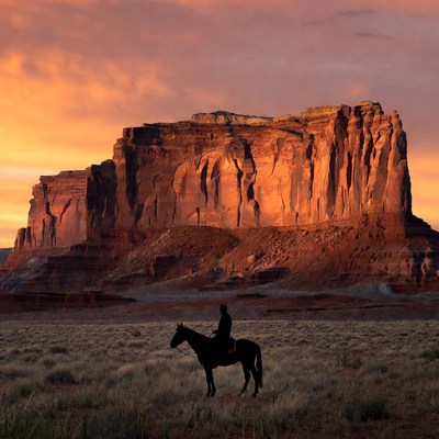 Cowboy on Horse at Sunset Mesa
