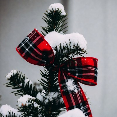 Snowy Christmas Tree with Red Plaid Bow