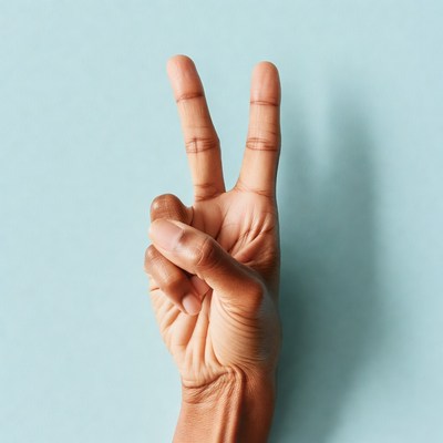 Hand making peace sign
