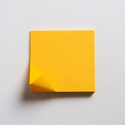 Yellow sticky note peeling corner