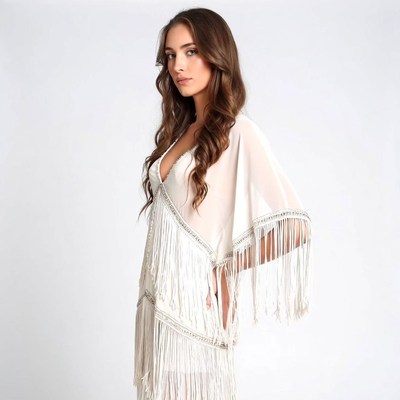 Woman in white fringed dress