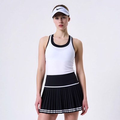 Woman in Nike tennis outfit