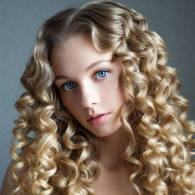 Beautiful woman with curly blonde hair