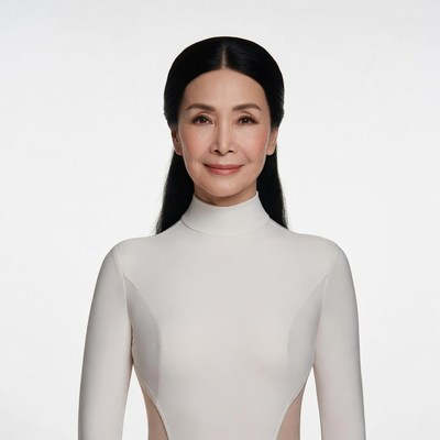 Asian woman in white turtleneck