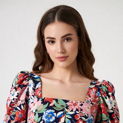 Woman in floral square-neck blouse