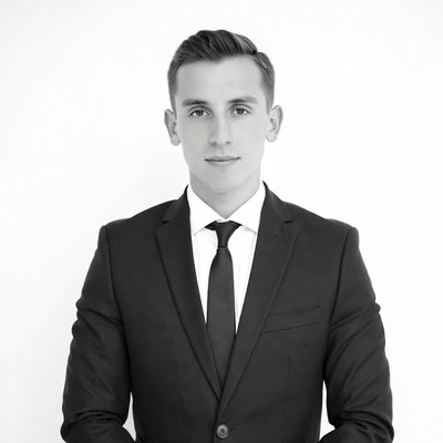 Young man in black suit