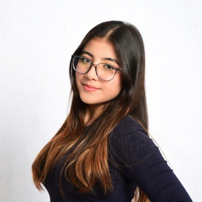 Young Asian woman in glasses smiling