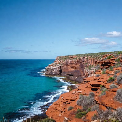 Red Cliffs Over Turquoise Ocean