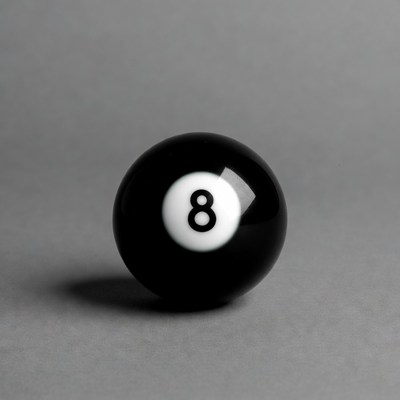 Black 8 Ball on Gray Background