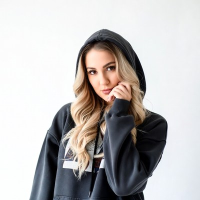 Blonde woman in hoodie
