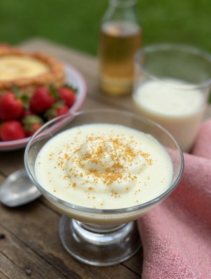 Creamy pudding with strawberries and milk