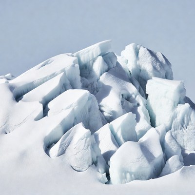 Large Iceberg in Snowy Landscape