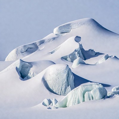 Iceberg formations in snowy landscape