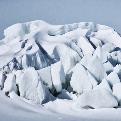 Large Iceberg in Snowy Landscape