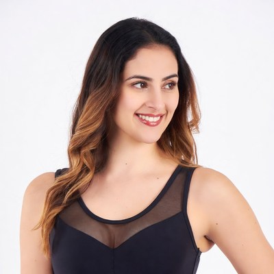 Smiling woman in black mesh top
