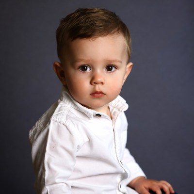 Toddler boy in white shirt