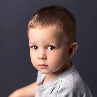 Toddler boy serious portrait