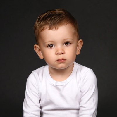 Toddler boy with serious expression