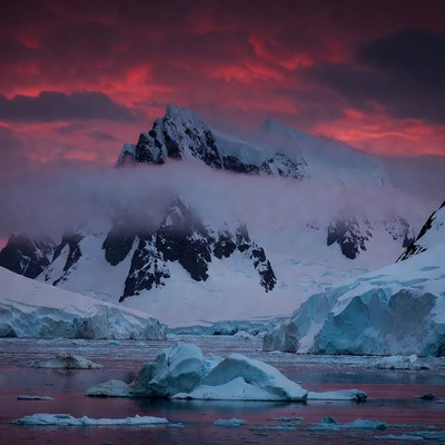 Red Sunset Over Snowy Antarctic Mountains