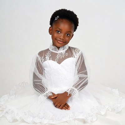 African girl in white lace dress