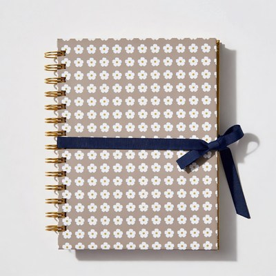 Gray notebook with white daisies
