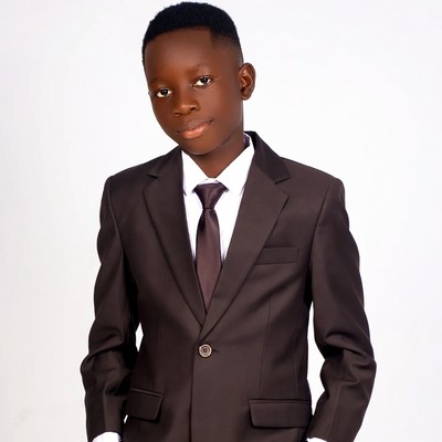 Young African boy in suit
