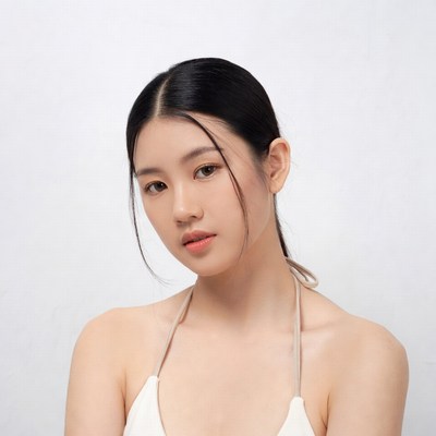 Asian woman in white tube top
