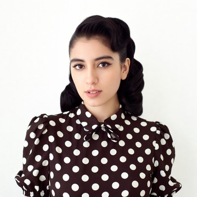 Woman in polka dot dress with pin-up hairstyle