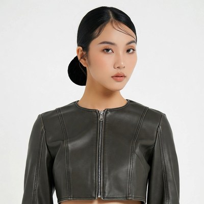 Asian woman in black leather jacket